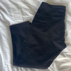 Lululemon, black 3/4 length gym pants. Mid-rise.